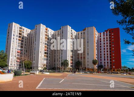 Colourful apartment tower blocks and Winter sun at Villajoyosa, Costa Blanca, Alicante, Spain Stock Photo