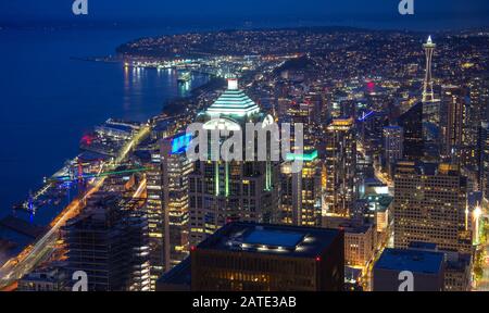 View of skyscrapers in downtown at night, in Seattle, Washington. Rooftop panorama of night Seattle Stock Photo