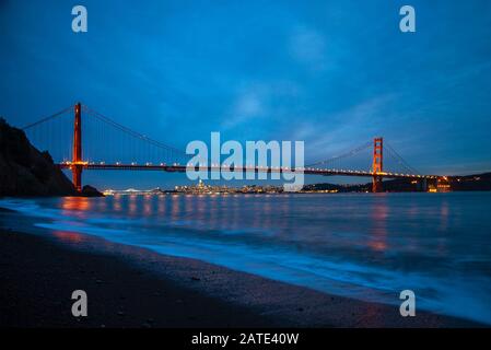 Golden Gate Bridge San Francisco California Night view from Kirby beach at night time with long exposure Stock Photo