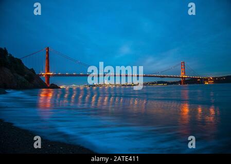Golden Gate Bridge San Francisco California Night view from Kirby beach at night time with long exposure Stock Photo