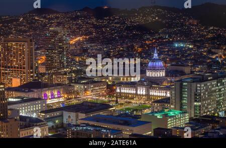 City hall of San Francisco Civic Center at night aerial view. Beautiful dusk panoramic view of central district and City Hall building at San Francisc Stock Photo