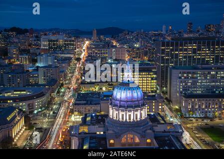 City hall of San Francisco Civic Center at night aerial view. Beautiful dusk panoramic view of central district and City Hall building at San Francisc Stock Photo