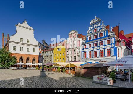 Szczecin, West Pomeranian Province, Poland. Hay Market square with Old City Hall and rebuilt tenements houses. Stock Photo