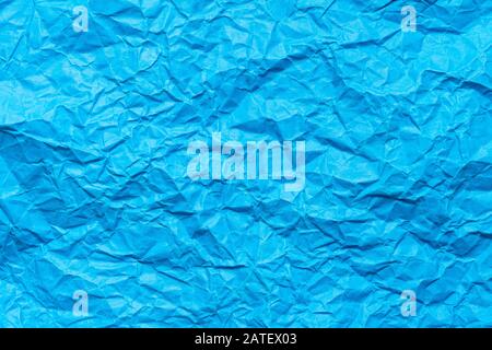 Blue crumpled paper background Stock Photo