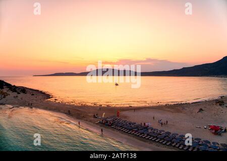 Aerial view of Simos beach at sunset in Elafonisos island in Greece. Elafonisos is a small Greek island the Peloponnese with idyllic exotic beaches an Stock Photo