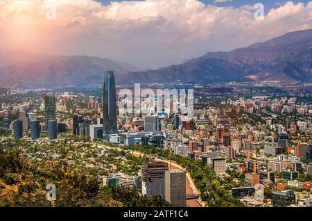 View of Santiago de Chile with Los Andes mountain range in the back at sunset time Stock Photo