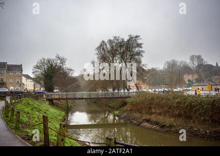 A view of the 'Jenson Button bridge' a footbridge crossing the river Frome in the town of Frome Stock Photo