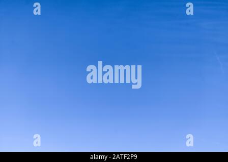Clear cloudless - slightly cloudy - blue sky on the sunny day - background texture Stock Photo