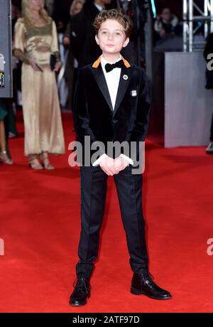 Roman Griffin Davis attending the 73rd British Academy Film Awards held at the Royal Albert Hall, London. Stock Photo