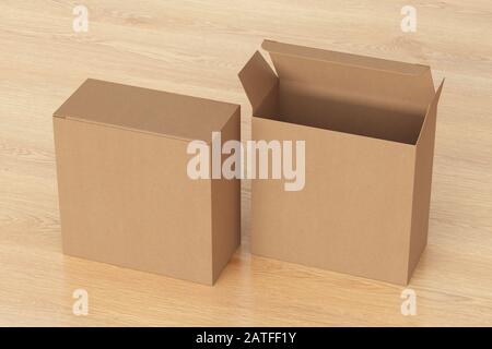 Blank cardboard wide square box with open and closed hinged flap lid on wooden background. Clipping path around box mock up Stock Photo