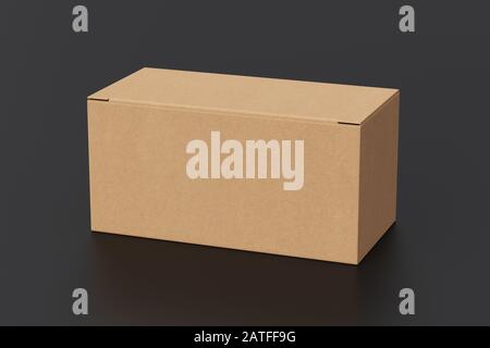 Blank cardboard wide box with closed hinged flap lid on black background. Clipping path around box mock up Stock Photo