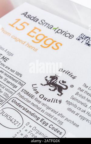 Close up food label on plastic egg box from ASDA. Plastic food packaging, nutrition labels, food labelling, British Lion Quality logo. Stock Photo