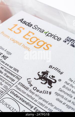 Close up food label on plastic egg box from ASDA. Plastic food packaging, nutrition labels, food labelling, British Lion Quality logo. Stock Photo