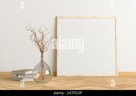 Blank square poster frame mock up standing on light herringbone parquet floor next to white wall with vase and books. Clipping path around poster. 3d Stock Photo