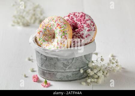 Yummy donuts with various types of toppings Stock Photo