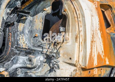 Burnt out car after a severe accident, Germany Stock Photo