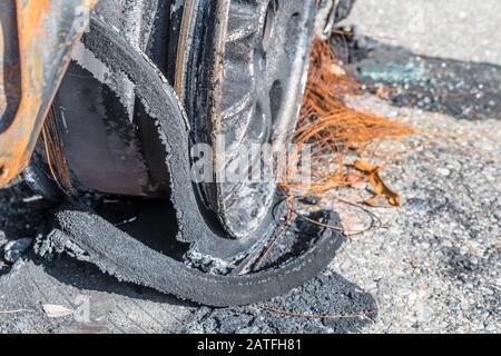 Burnt out car after a severe accident, Germany Stock Photo