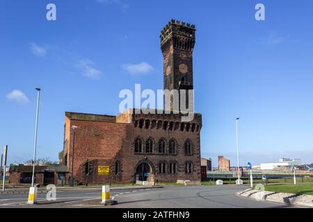 Central hydraulic tower, used to power movement of lock gates and bridges, Four Bridges, Birkenhead Stock Photo