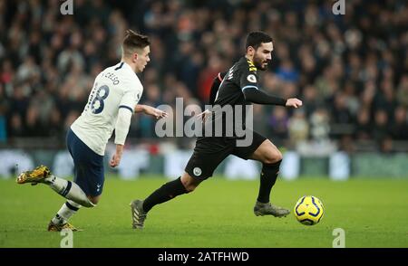 Tottenham Hotspur's Giovani Lo Celso (left) and Manchester City's Ilkay Gundogan in action during the Premier League match at Tottenham Hotspur Stadium, London. Stock Photo
