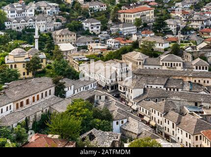 19th-century traditional Ottoman houses, mosque, from Castle hill in Gjirokastra (Gjirokaster), UNESCO World Heritage Site, Albania Stock Photo