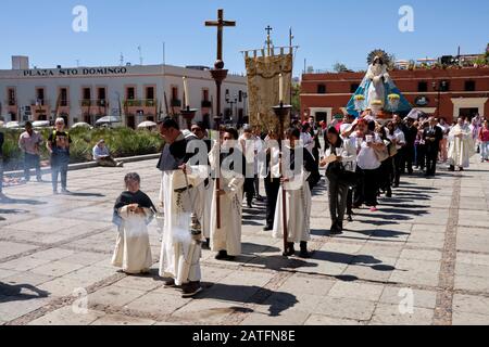 Oaxaca de Juarez, Mexico. February 2nd, 2020. As per Mexican tradition on Día de la Candelaria (Candlemas) people dress up images of the Christ Child in special outfits and officially present them to church to be blessed. At a special Eucharist for the event at Santo Domingo de Guzmán church, a procession with candles, the Christ Child and the Virgin Mary enters the church. The day is celebrated by the Catholic church as the feast of the Purification of the Virgin or alternatively, as the Presentation of Jesus at the Temple. Credit: meanderingemu/Alamy Live News Stock Photo