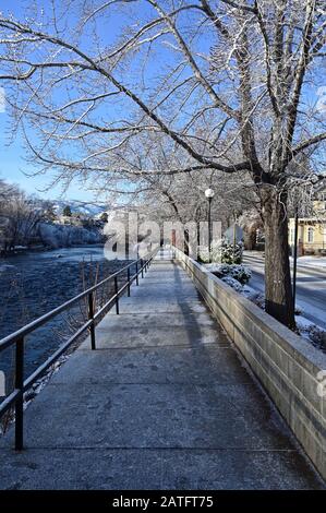 Reno, Nevada - January 17, 2020: Truckee River Walk in early morning after snowstorm. Stock Photo