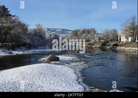 Reno, Nevada - January 17, 2020: Truckee River and Wingfield Park in early morning after snowstorm. Stock Photo