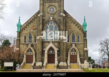 landmark neo-gothic style church front entrance and facade in lincoln village neighborhood of milwaukee wisconsin Stock Photo