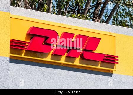 Aug 7, 2019 Sunnyvale / CA / USA - DHL sign at one of the Company's offices in San Francisco Bay Area; DHL International GmbH is an international cour Stock Photo