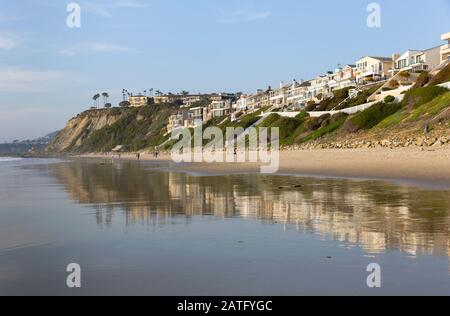 Strands Beach on the Pacific Ocean with luxury homes and a public beach in Dana Point, California Stock Photo