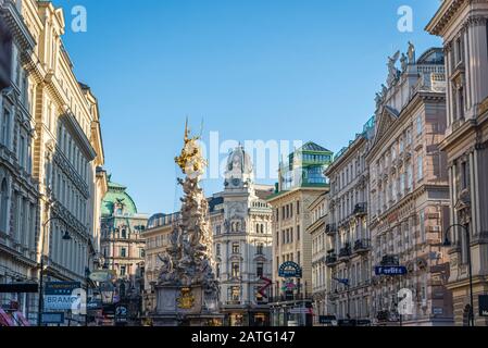 Shopping thoroughfare in Vienna including the Column of Pest (Column of The Trinity), The Graben, Austria Stock Photo