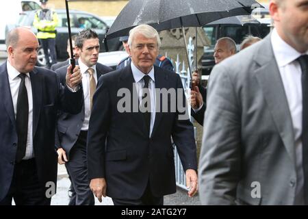 Former British Prime Minister John Major arrives for the funeral of the fomer Taoiseach (Irish Prime Minister) Albert Reynolds at the Sacred Heart Church in Donnybrook in Dublin, Monday August 25, 2014. Mr Reynolds died last Thursday aged 81 after a long illness. Taoiseach Enda Kenny, President Michael D Higgins and several serving and past politicians attended the funeral mass. The State funeral was Mr Reynolds, who is survived by his wife Kathleen, two sons and five daughters, will be buried with full military honours at Shanganagh Cemetery in south Dublin. Photo/Paul McErlane Stock Photo