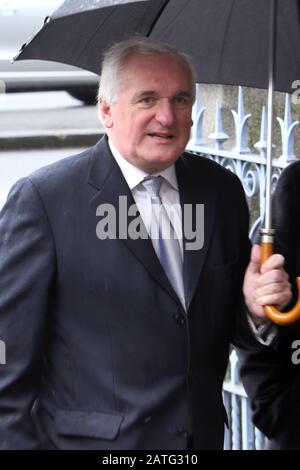 Former Taoiseach Bertie Ahern follows the funeral of  fomer Taoiseach (Irish Prime Minister) Albert Reynolds, as it is carried out by Irish soldiers following equiem mass at the Sacred Heart Church in Donnybrook in Dublin, Monday August 25, 2014. Mr Reynolds died last Thursday aged 81 after a long illness. Taoiseach Enda Kenny, President Michael D Higgins and several serving and past politicians attended the funeral mass. The State funeral was Mr Reynolds, who is survived by his wife Kathleen, two sons and five daughters, will be buried with full military honours at Shanganagh Cemetery in sout Stock Photo