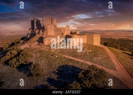 Aerial view of medieval castle ruin Pueble de Almenara in Cuenca Spain with convenctric walls, semicircular towers and angle bastions Stock Photo