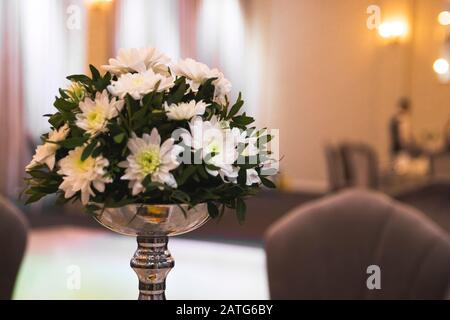Flower decorations on wedding table Stock Photo
