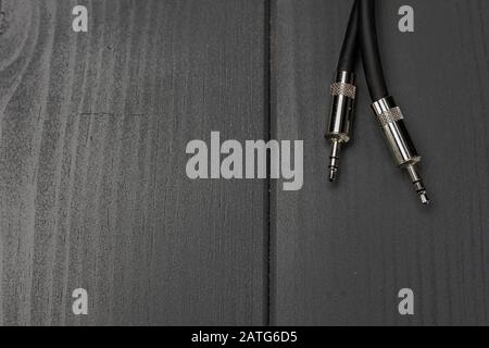 Two male mini jack type audio connectors for connecting audio devices with stereo signals Stock Photo