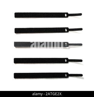 black velcro cable ties on white background Stock Photo