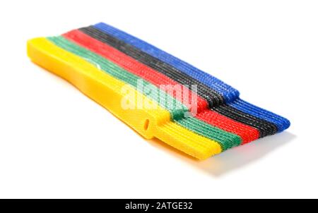 multi-color velcro cable tie and cable on white Stock Photo