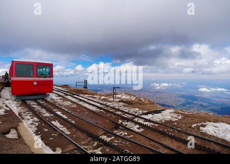 A high mountain train waits at the summit to start its journey back down. Stock Photo