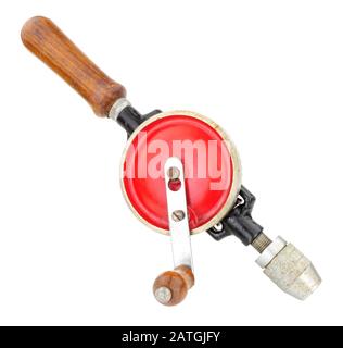 Old single pinion manual egg beater style hand drill isolated on a white background Stock Photo