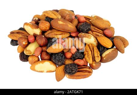 Group of mixed shelled nut kernels and raisins with Brazil nuts, peanuts, hazelnuts, almonds, pecan nuts isolated on a white background Stock Photo