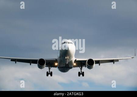 Air New Zealand jet aircraft passenger flight landing at Wellington airport, New Zealand Stock Photo