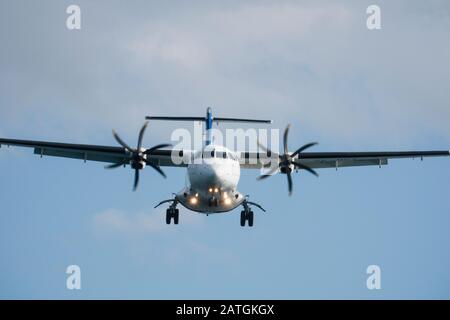 Air New Zealand turbo-prop plane landing at Wellington airport, New Zealand Stock Photo