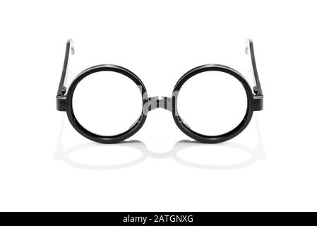 Pair of vintage reading spectacles with round frames isolated on white with reflection Stock Photo