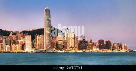 Hong Kong skyline at sunrise from kowloon side, Victoria harbour Stock Photo