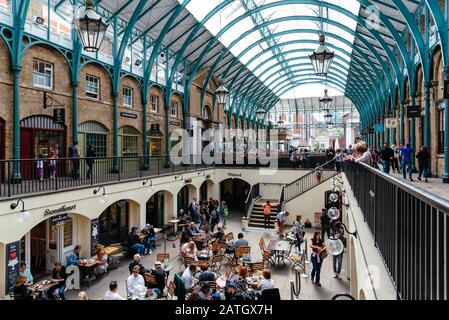 London, UK - May 15, 2019: Interior view of Covent Garden Market. Located in the West End of London, Covent Garden is renowned for its luxury fashion Stock Photo