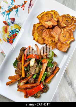 Chopped steak or Bistec Picao and patacones or tostones are fried green plantain slices, made with green plantains, Tipical Panamá food, Panamá, Centr Stock Photo