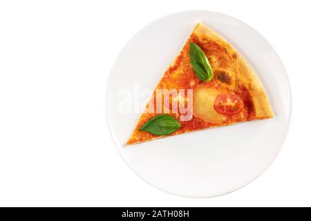 Slice of italian classic Pizza with mozzarella, basil and tomato on white plate isolated on white background. Stock Photo