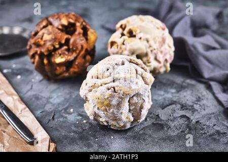 Different flavors of ball shaped traditional German sweet food called 'Schneeballen', meaning 'Snowball', made from shortcrust pastry Stock Photo