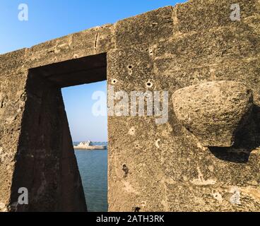 Details on the walls of the ancient Portuguese built fort by the sea in the island of Diu in India. Stock Photo